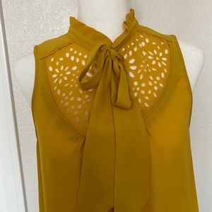 Golden yellow blouse. Size small.